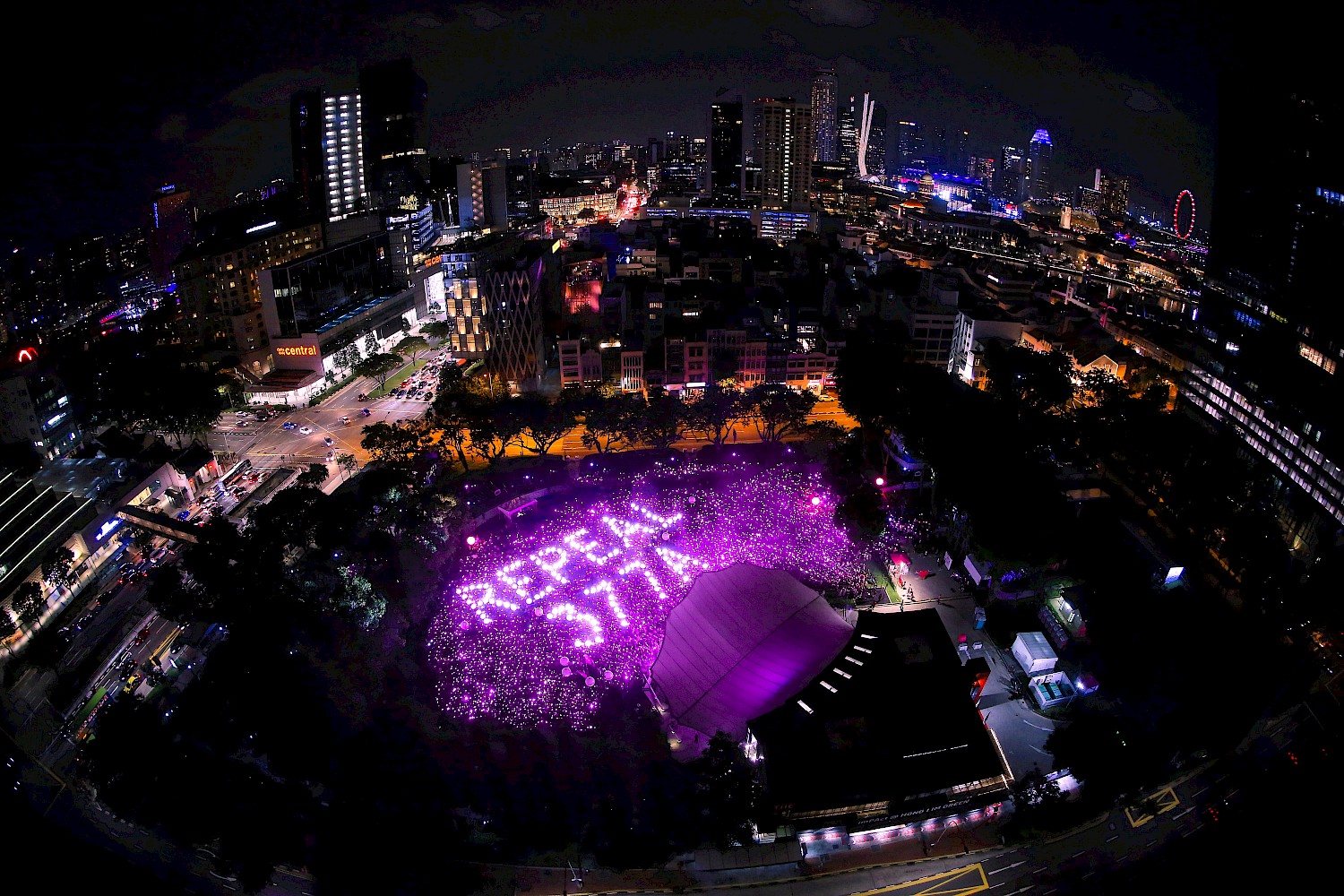 Pink Dot, aerial view of the “Repeal 377A” light-up at night in Hong Lim Park in 2019. Pink Dot SG