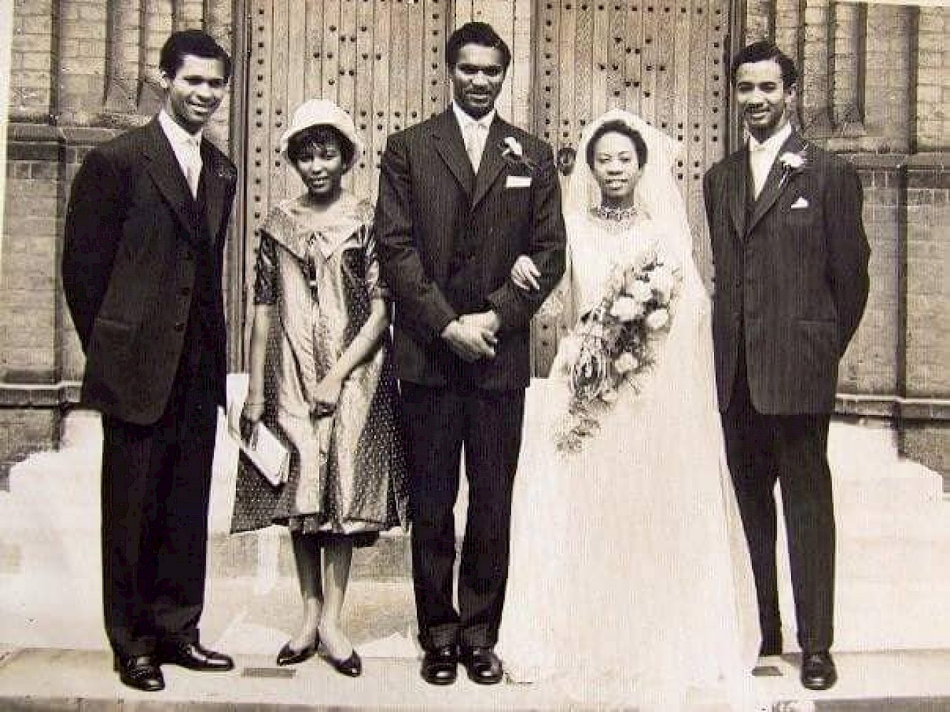 Unidentified photographer. The Wedding of John Willie Kwamina Duncan and Beatrice Orleans-Harding, St. Patrick’s Church, London. From Left to Right: Ekow Duncan, Elaine Buckle, John Willie Kwamina Duncan, Beatrice Duncan née Orleans-Harding, Josbert Thomas Kofi Duncan. August 22, 1959