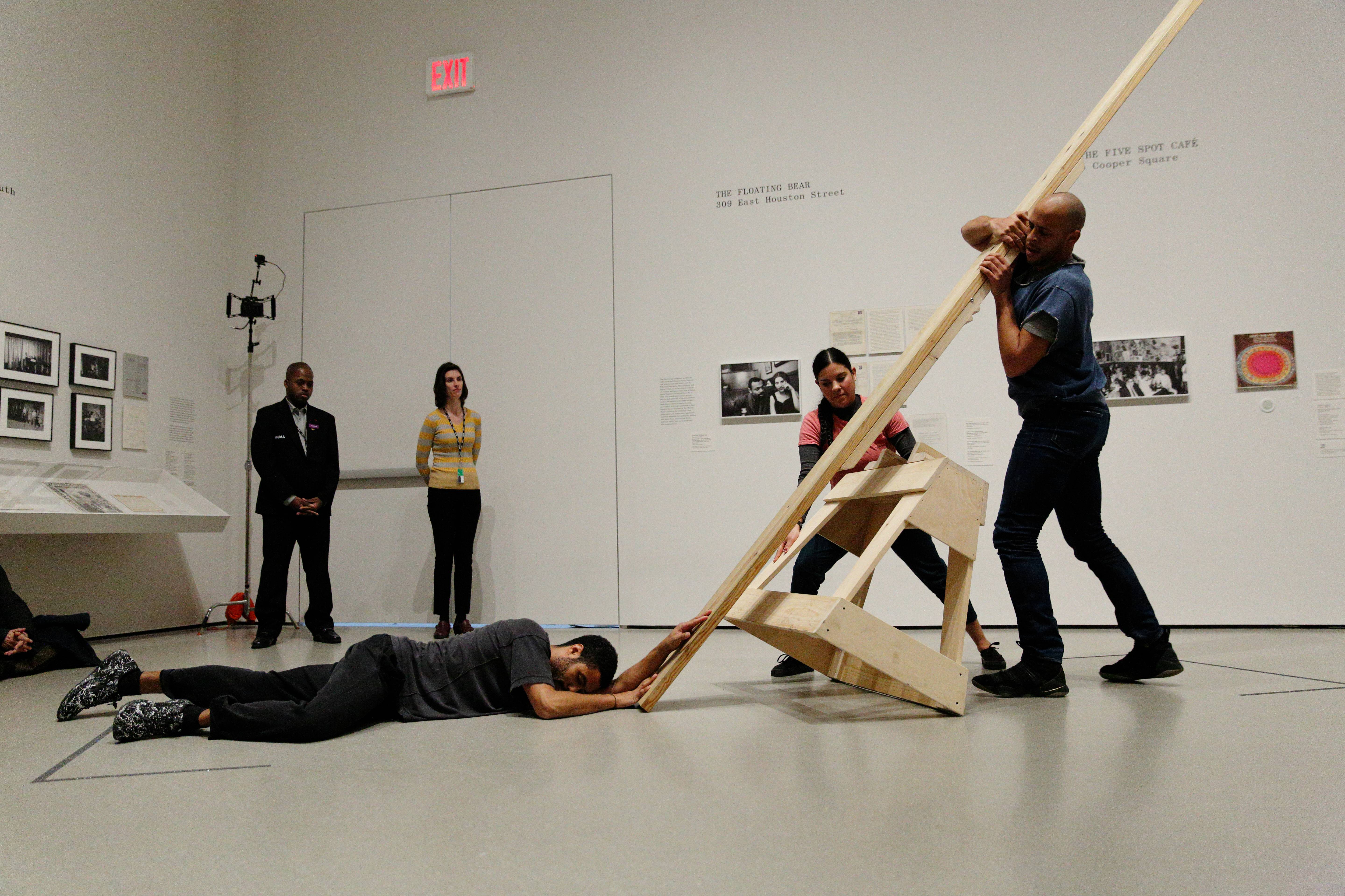 <em>Figures 3 & 4</em>. Simone Forti, <em>See Saw</em>, 1960. Performance with plywood seesaw. The Museum of Modern Art, New York. Committee on Media and Performance Art Funds, 2015. Re-Interpreted by Will Rawls and Andros Zins-Browne. Performed by Martita Abril, Will Rawls, and Andros Zins-Browne as part of the exhibition <em>Judson Dance Theater: The Work Is Never Done</em> at The Museum of Modern Art. 2019. Object identifications: EV5439_018; EV5439_009. Photographs by Paula Court. 2022 © Photo Scala, Florence. The Museum of Modern Art, New York